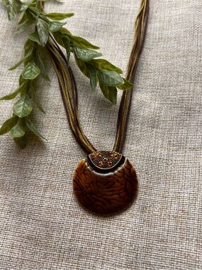 VINTAGE Bohemian Brown and Green Corded Necklace w Brown Enamel Circle Pendant